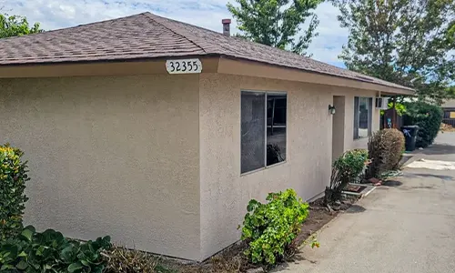 Freshly painted exterior wall of a single-story home
